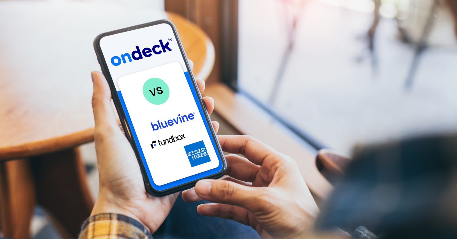 Person holding phone comparing OnDeck, Bluevine, Fundbox and American Express.